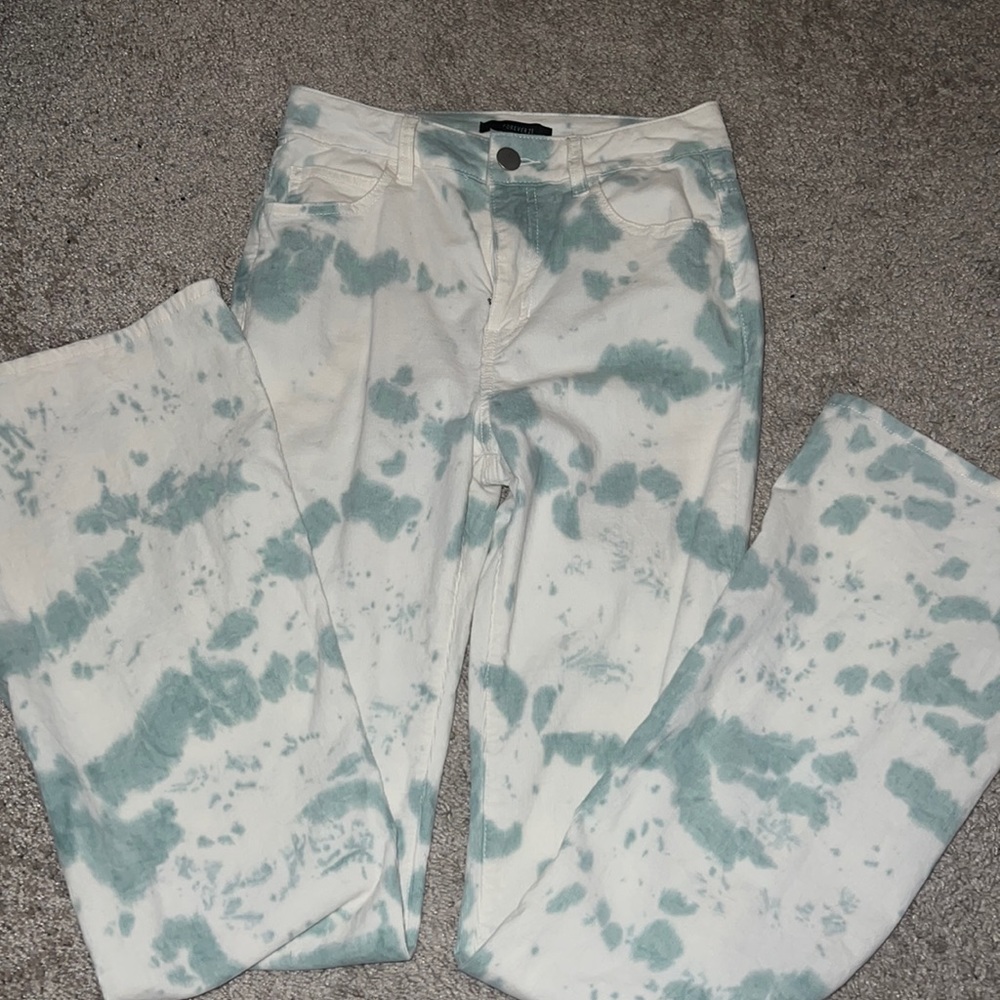 Teal and white print flare pants